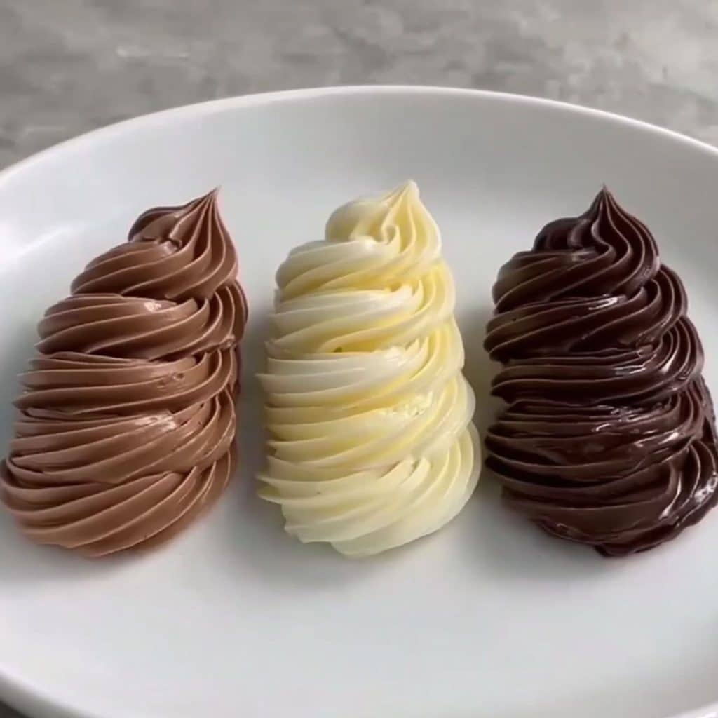 Rich, glossy chocolate ganache ready to use as a cake filling — dark, milk, and white chocolate versions.